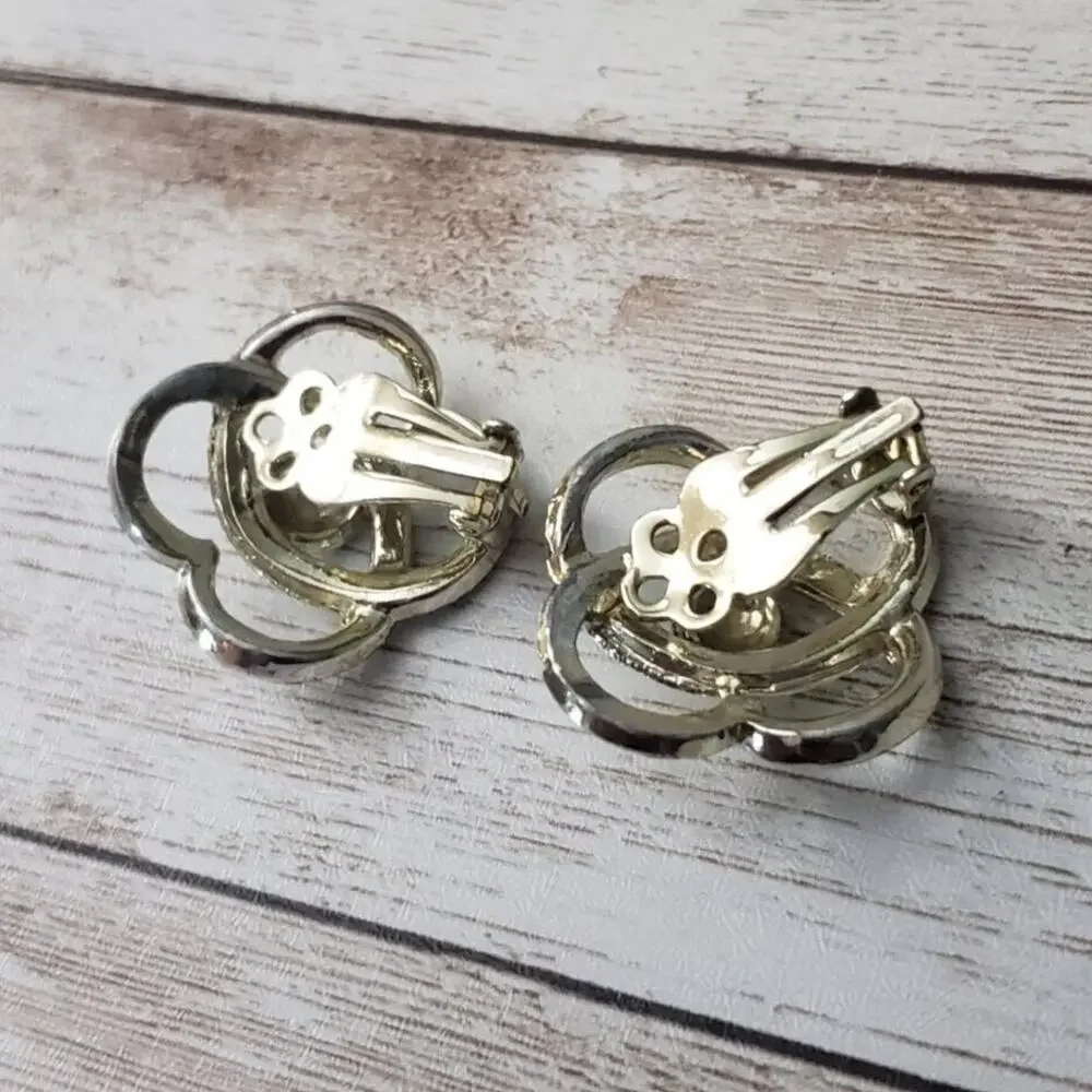 Vintage Clip On Earrings-  Interlocking 4 Point Flower Design Light Gold Tone